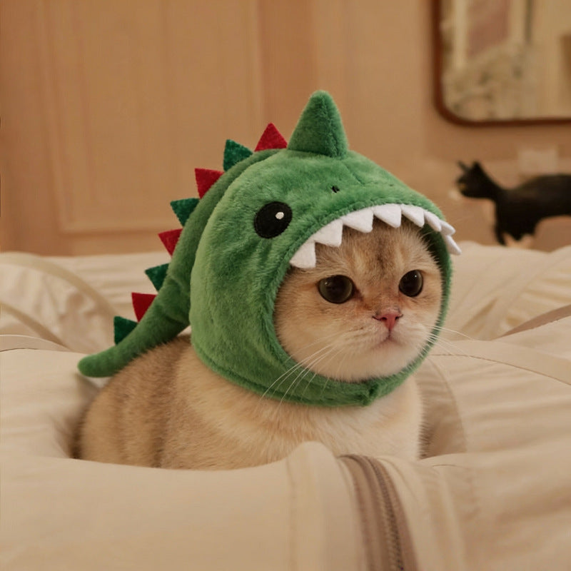 Dinosaur cat hood with wind-up chick toy accessory